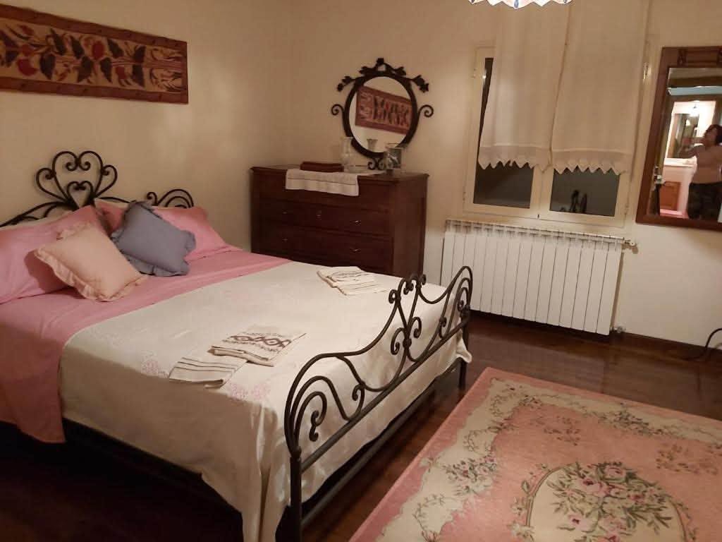 Camera con letto matrimoniale di Casale Santilli